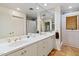 Bathroom with double vanity, large mirror and shower at 4531 E Quartz Mountain Rd, Paradise Valley, AZ 85253