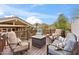 Relaxing deck with fire pit and comfortable seating at 4531 E Quartz Mountain Rd, Paradise Valley, AZ 85253
