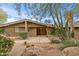Inviting home exterior featuring a charming walkway and landscaping at 4531 E Quartz Mountain Rd, Paradise Valley, AZ 85253