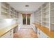 Home office featuring built-in shelving and dual workspaces at 4531 E Quartz Mountain Rd, Paradise Valley, AZ 85253