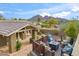 Outdoor patio with fire pit and seating area at 4531 E Quartz Mountain Rd, Paradise Valley, AZ 85253