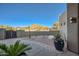 Landscaped backyard with a gate and mountain views at 8300 E Dixileta Dr # 281, Scottsdale, AZ 85266