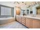 Large bathroom with double vanity and a soaking tub at 8300 E Dixileta Dr # 281, Scottsdale, AZ 85266