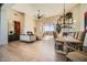 Open concept dining room and living area with hardwood floors at 8300 E Dixileta Dr # 281, Scottsdale, AZ 85266