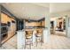 Gourmet kitchen boasts granite countertops, stainless steel appliances, and an island with seating at 8300 E Dixileta Dr # 281, Scottsdale, AZ 85266