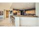 Modern kitchen with granite countertops, custom cabinetry, and stainless steel appliances at 8300 E Dixileta Dr # 281, Scottsdale, AZ 85266