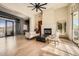 Bright and airy living area with hardwood floors and a fireplace at 8300 E Dixileta Dr # 281, Scottsdale, AZ 85266