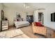 Main bedroom with hardwood floors and ensuite bathroom access at 8300 E Dixileta Dr # 281, Scottsdale, AZ 85266