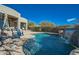 Inviting pool with waterfall feature at 8300 E Dixileta Dr # 281, Scottsdale, AZ 85266