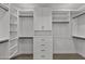 Large walk-in closet with ample shelving and hanging space at 10894 E Mission Ln, Scottsdale, AZ 85259