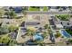 Aerial view showing home with pool, solar panels and desert landscaping at 12058 N 92Nd Pl, Scottsdale, AZ 85260