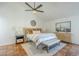 Spacious main bedroom with high ceilings and a ceiling fan at 12058 N 92Nd Pl, Scottsdale, AZ 85260