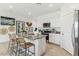 Modern kitchen with island, granite countertops, and stainless steel appliances at 1562 E Mason Dr, Casa Grande, AZ 85122