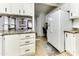 White cabinets and granite countertops highlight this kitchen's modern design at 17200 W Bell Rd # 1731, Surprise, AZ 85374