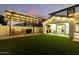Backyard patio with pergola, grill, and seating area at 19641 E Emperor Blvd, Queen Creek, AZ 85142