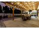 Patio with pergola, string lights, and dining area at 19641 E Emperor Blvd, Queen Creek, AZ 85142