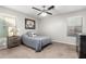 Bedroom with ceiling fan and gray bedding at 19641 E Emperor Blvd, Queen Creek, AZ 85142