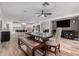 Open concept dining area with kitchen views and wood dining table at 19641 E Emperor Blvd, Queen Creek, AZ 85142