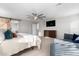 Main bedroom with ensuite bathroom access, ceiling fan, and ample space at 19641 E Emperor Blvd, Queen Creek, AZ 85142