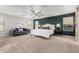 Spacious main bedroom with sitting area and an accent wall at 19641 E Emperor Blvd, Queen Creek, AZ 85142