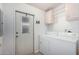 Convenient laundry room with washer, dryer and extra storage at 205 S Higley Rd # 32, Mesa, AZ 85206