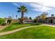 Landscaped backyard with pool and patio at 2146 E Whitton Ave, Phoenix, AZ 85016