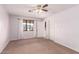 Well-lit bedroom with carpet and ample closet space at 2146 E Whitton Ave, Phoenix, AZ 85016