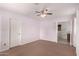 Bright bedroom with ceiling fan and neutral decor at 2146 E Whitton Ave, Phoenix, AZ 85016