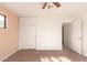 Bedroom with sliding door closet and ceiling fan at 2146 E Whitton Ave, Phoenix, AZ 85016