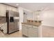 Modern kitchen with island and stainless steel refrigerator at 2146 E Whitton Ave, Phoenix, AZ 85016