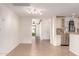 View into the kitchen from the dining area, showing stainless steel appliances at 2146 E Whitton Ave, Phoenix, AZ 85016