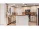 Bright kitchen with stainless steel appliances and granite countertops at 2146 E Whitton Ave, Phoenix, AZ 85016