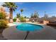 Relaxing kidney-shaped pool in backyard at 2146 E Whitton Ave, Phoenix, AZ 85016