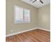 Bright bedroom with window and wood flooring at 3016 E Maplewood St, Gilbert, AZ 85297