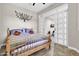 Spacious bedroom with sliding doors and wood flooring at 3016 E Maplewood St, Gilbert, AZ 85297