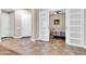 Home entry with tiled floor and sliding doors to bedroom at 3016 E Maplewood St, Gilbert, AZ 85297