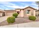 Single-story home with stone accents and landscaped front yard at 3016 E Maplewood St, Gilbert, AZ 85297