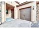 Two-car garage with paver driveway and walkway to front door at 3016 E Maplewood St, Gilbert, AZ 85297