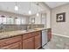 Kitchen with double sink, granite counters, and dishwasher at 3016 E Maplewood St, Gilbert, AZ 85297