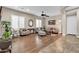 Living room with hardwood floors, ceiling fan, and comfortable seating at 3016 E Maplewood St, Gilbert, AZ 85297