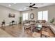 Living room with hardwood floors, ceiling fan, and comfortable seating at 3016 E Maplewood St, Gilbert, AZ 85297