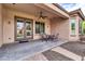 Covered patio with seating area and ceiling fan at 3016 E Maplewood St, Gilbert, AZ 85297