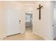 Light and bright entryway with wood-look floors at 31011 W Indianola Ave, Buckeye, AZ 85396