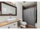 Clean bathroom with a shower/tub combo and modern vanity at 3921 E Shaw Butte Dr, Phoenix, AZ 85028