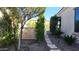 Pathway through the side yard with landscaping and lighting at 4855 S Astral Hts, Mesa, AZ 85212