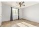 Bedroom with ceiling fan, tile floors, and window coverings at 5301 W Hearn Rd, Glendale, AZ 85306