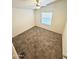 Bright bedroom with carpeted floor, window blinds, and ceiling fan at 9333 E University Dr # 51, Mesa, AZ 85207