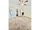 Spacious bedroom with ceiling fan and ensuite bathroom access at 9333 E University Dr # 51, Mesa, AZ 85207