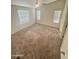 Spacious bedroom with two windows and ceiling fan at 9333 E University Dr # 51, Mesa, AZ 85207