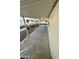 Covered patio with concrete flooring and metal railing at 9333 E University Dr # 51, Mesa, AZ 85207